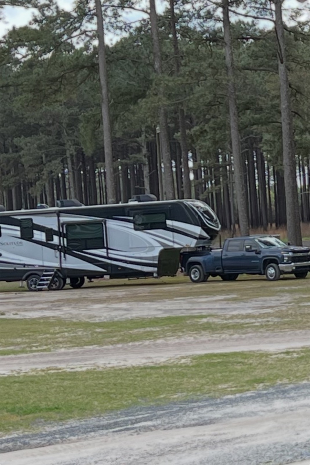 A Solitude RV with tow truck at Allen Brothers RV Destination