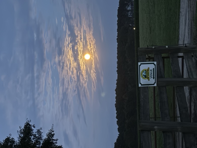 Sunset over the property gate